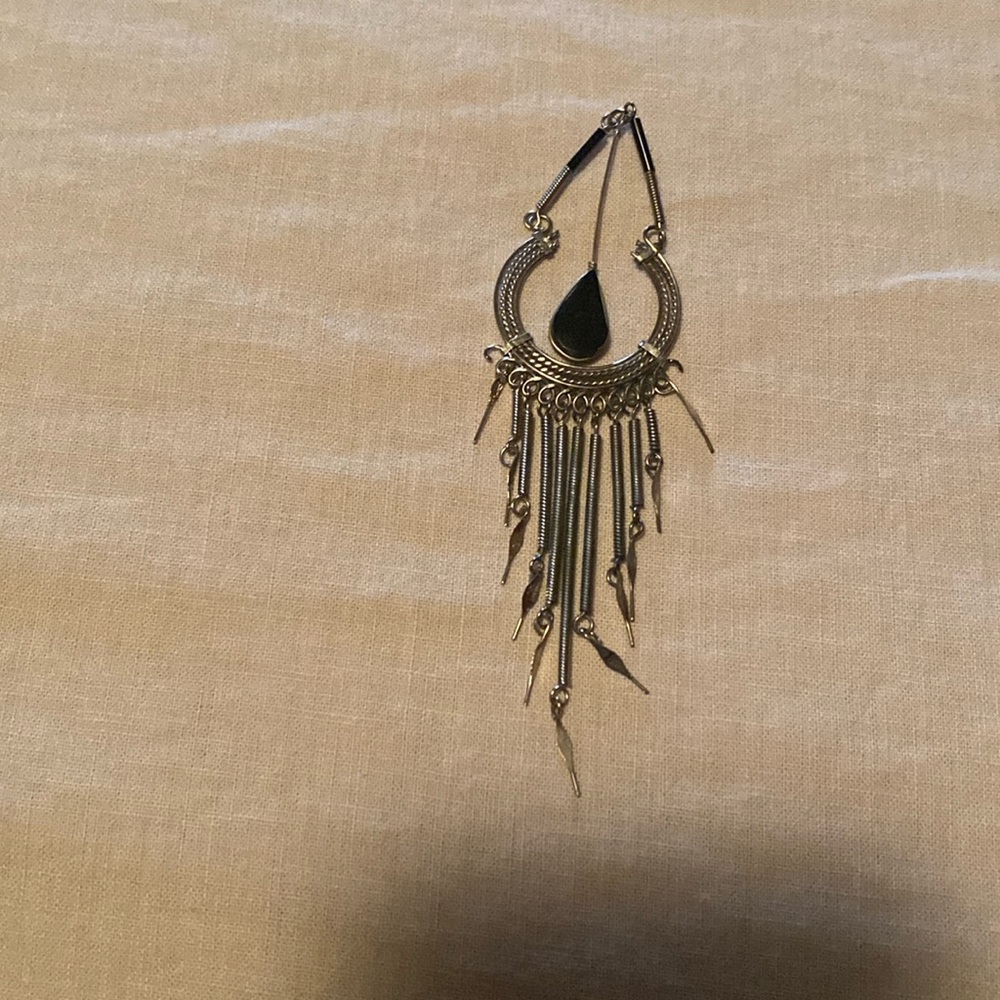 Unique silver pendant with blue inset